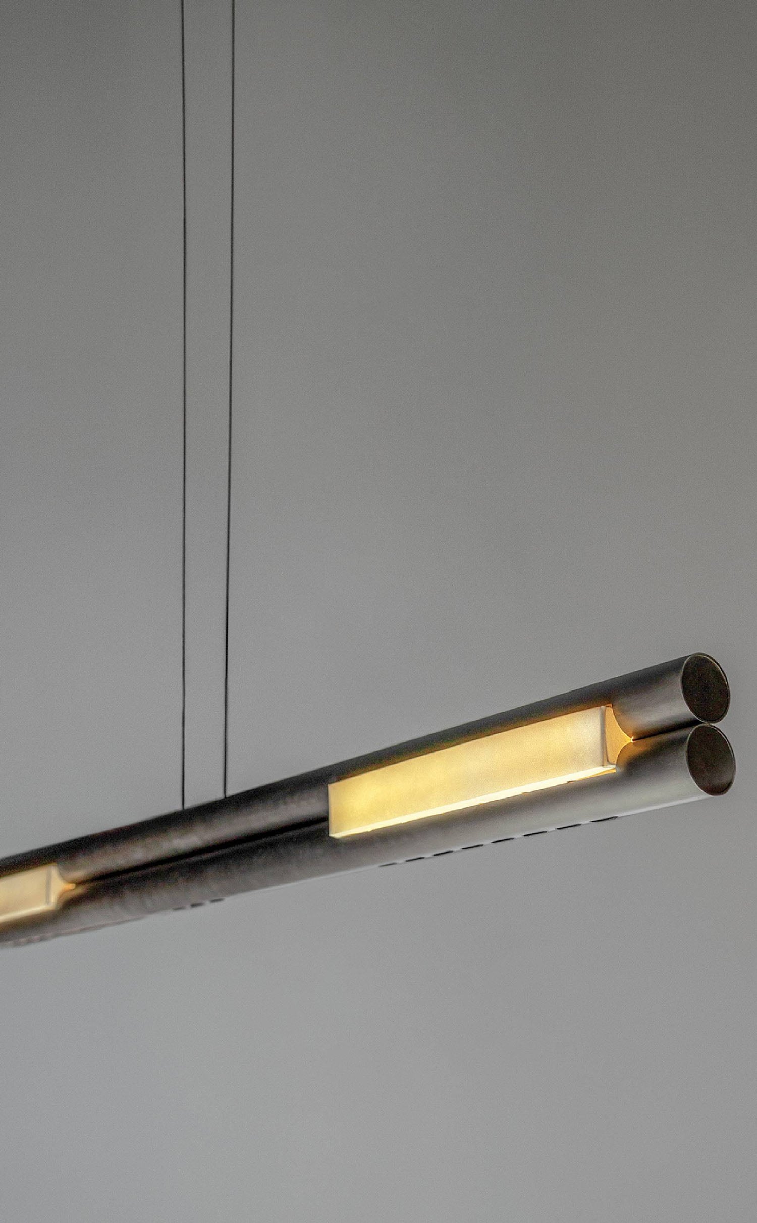 A light fixture hanging from a ceiling.