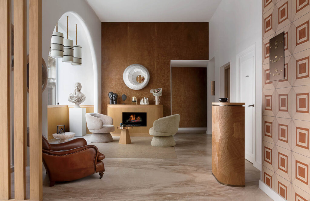 A living room with a fireplace and a chair.