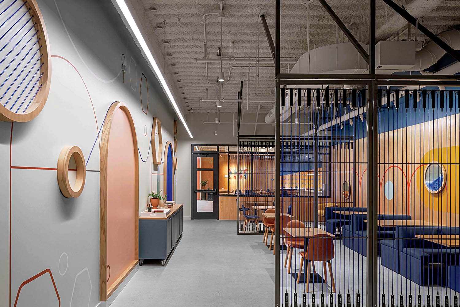 A room with a staircase and a staircase.