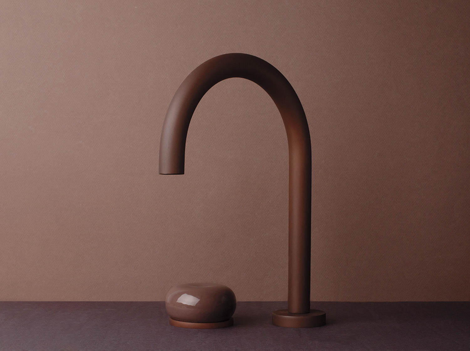 closeup of bronze sink with bronze tile