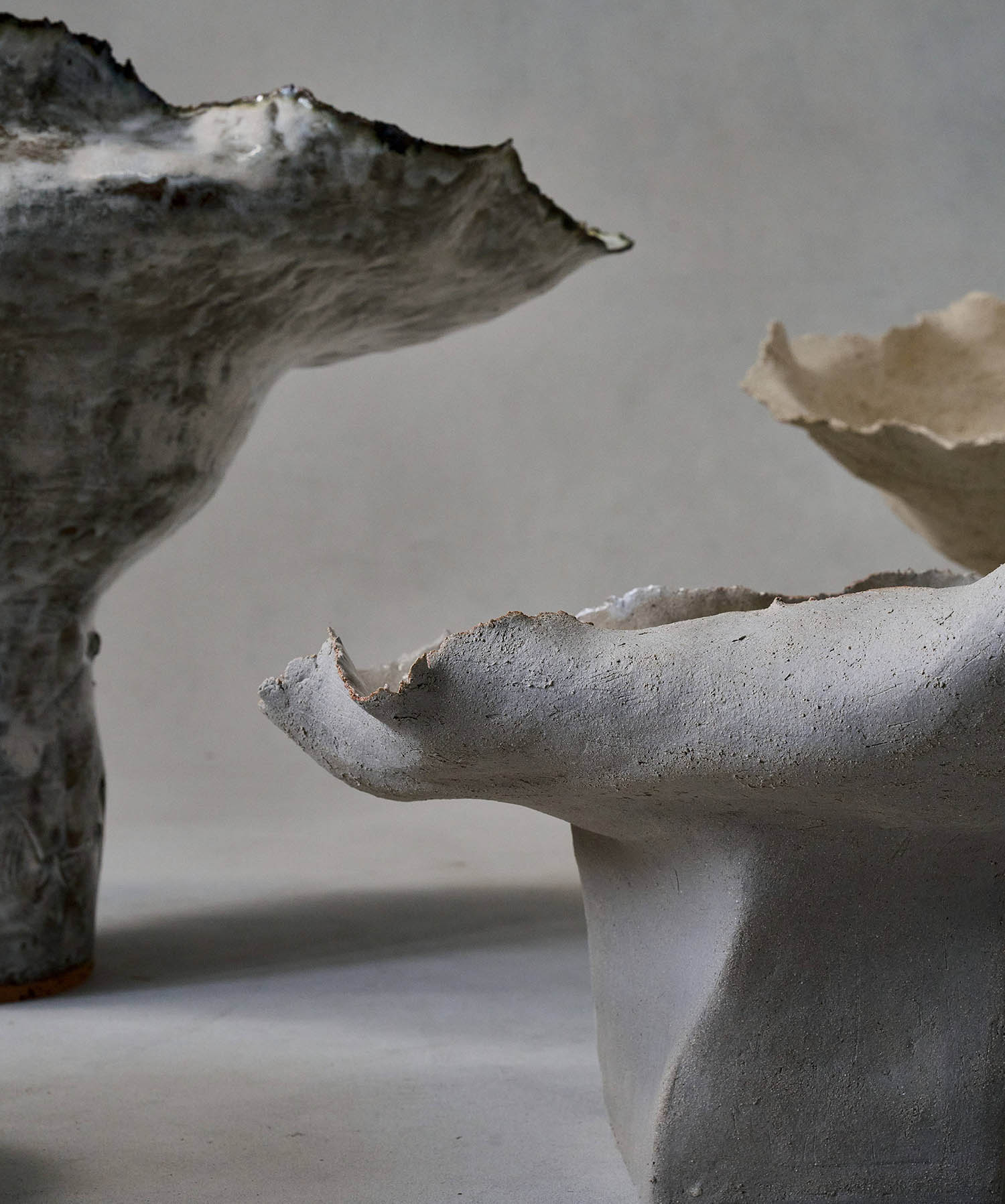 Two sculptures of clay and clay.