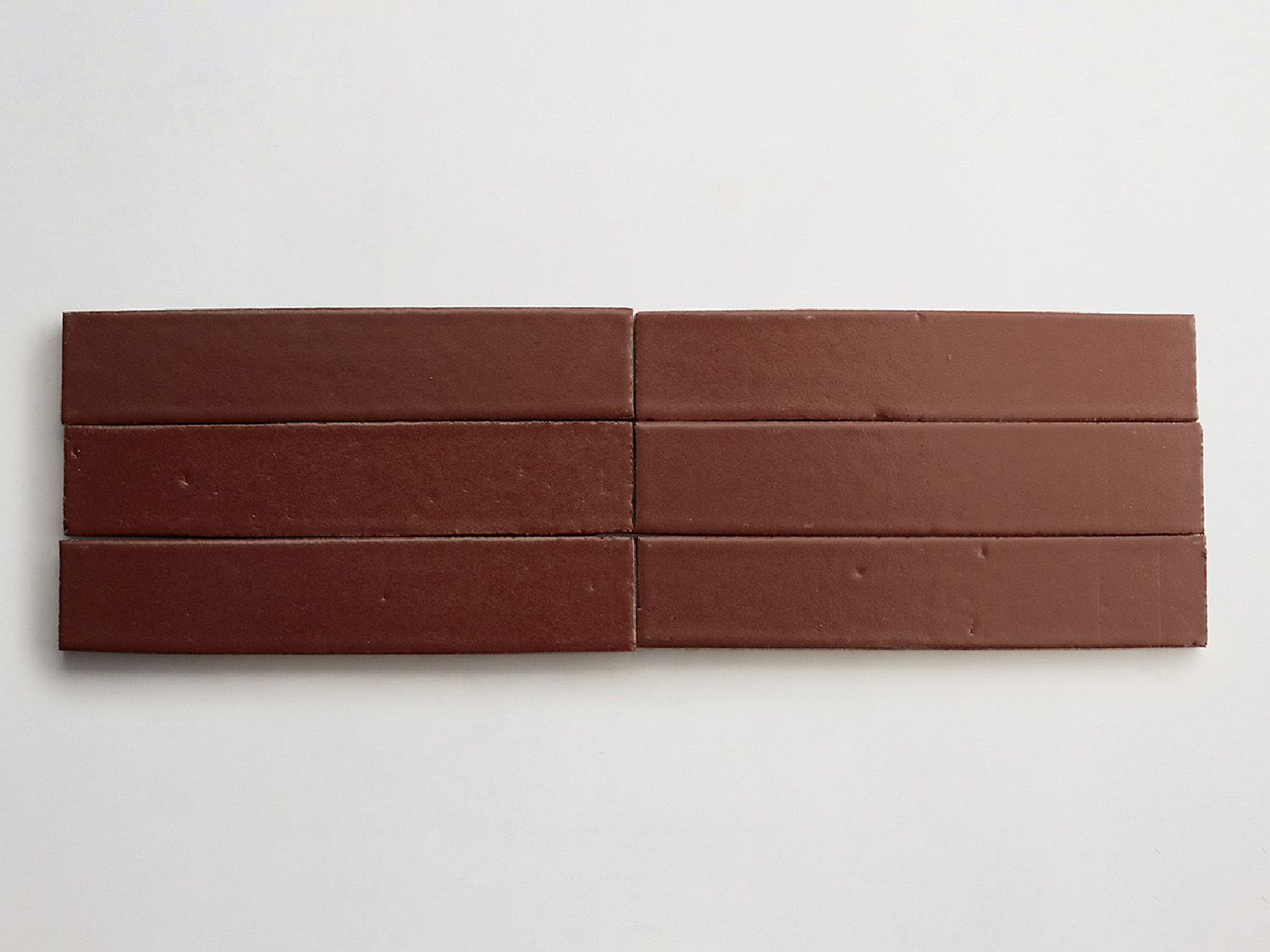 A piece of chocolate on a white surface