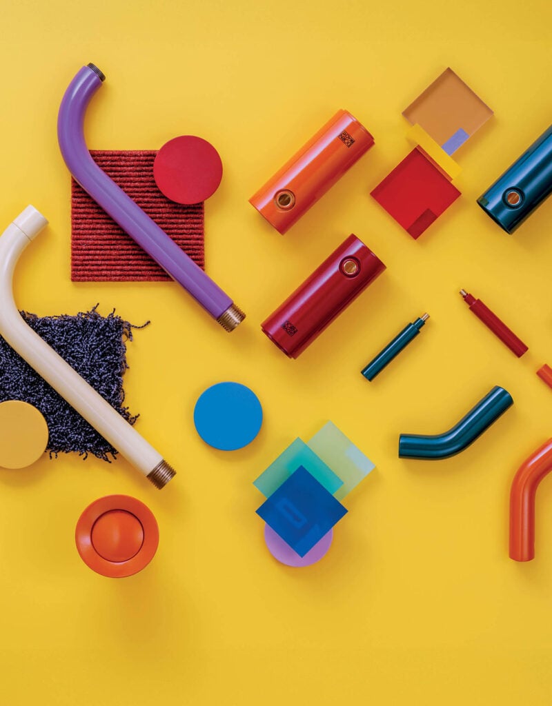 A yellow background with various colored objects.