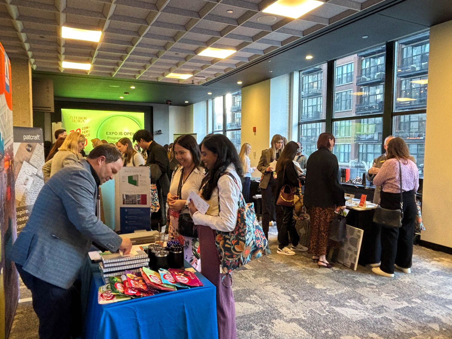 young designers exploring manufacturer booths