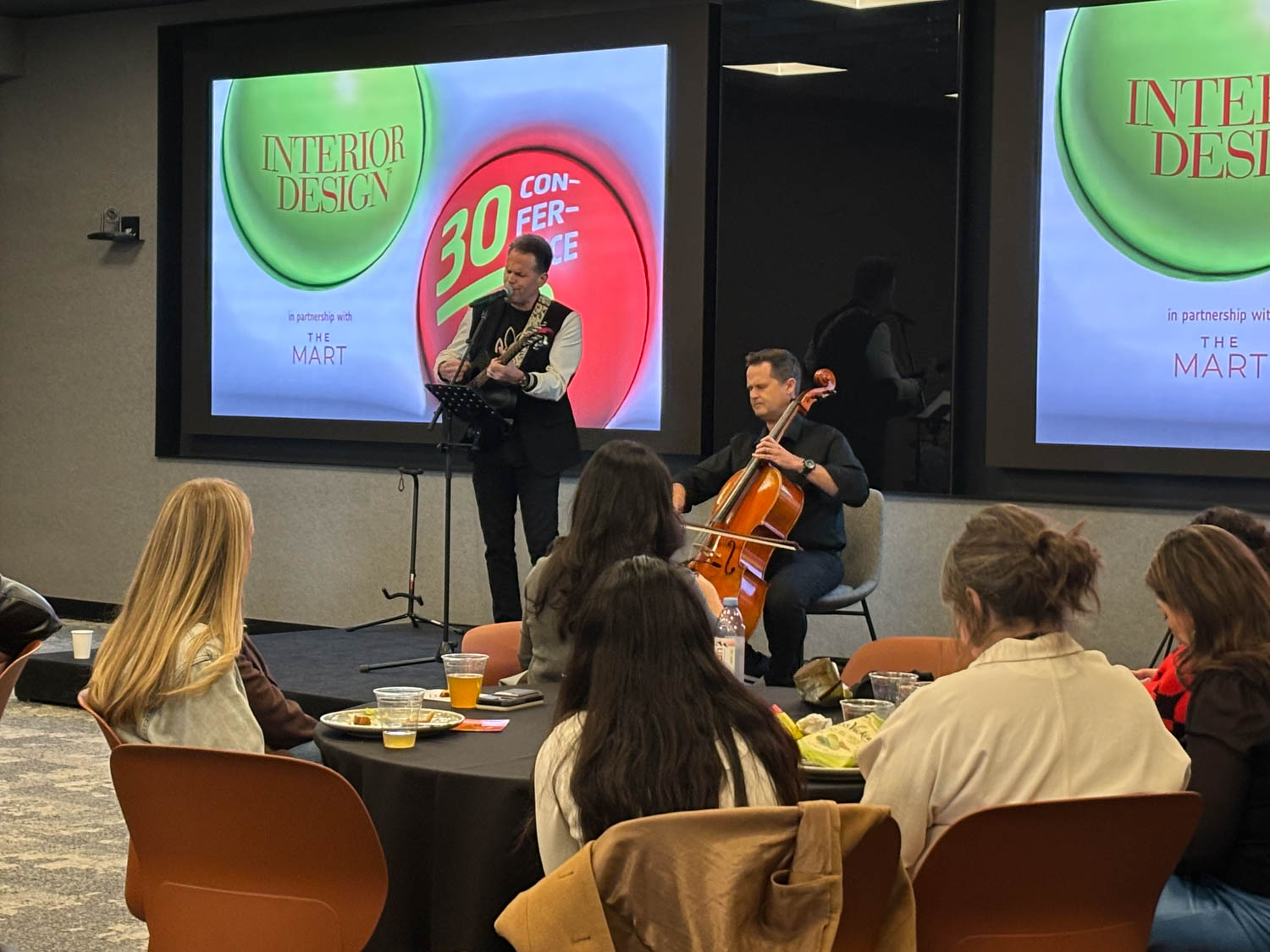two musicians performing on stage
