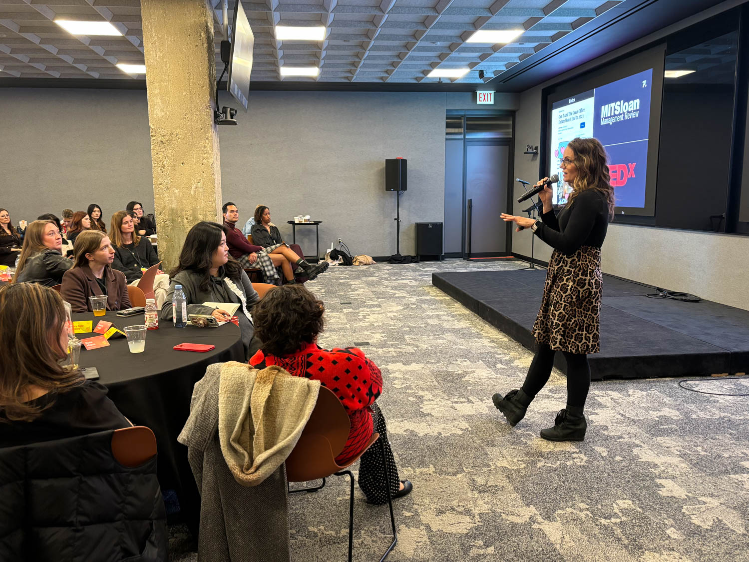 amanda schneider giving a keynote during the 30/30 national conference