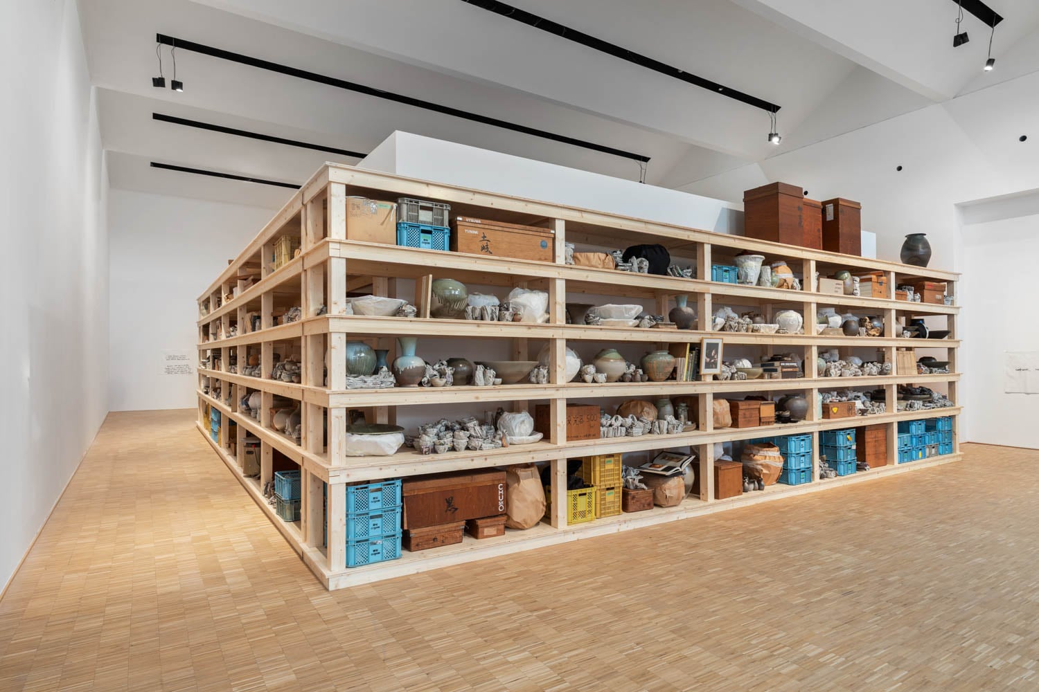 shelf full of porcelain vases