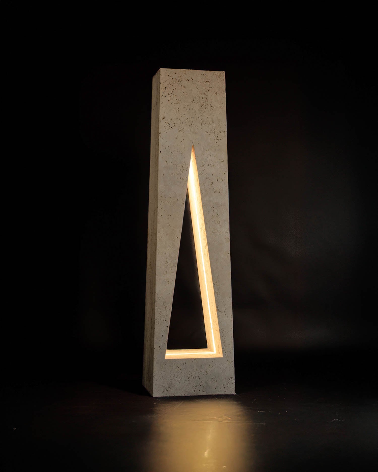 light sculpture with a triangular light