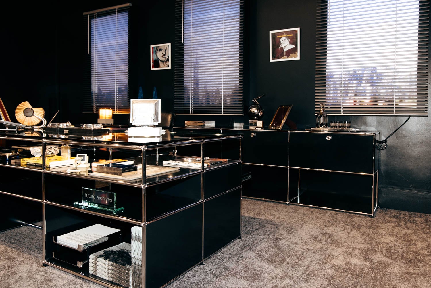 office space with black cabinets and shelves in room facing the mountains