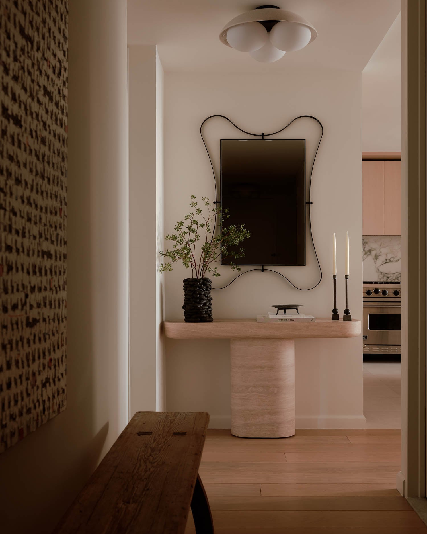 entryway with rectangular mirror