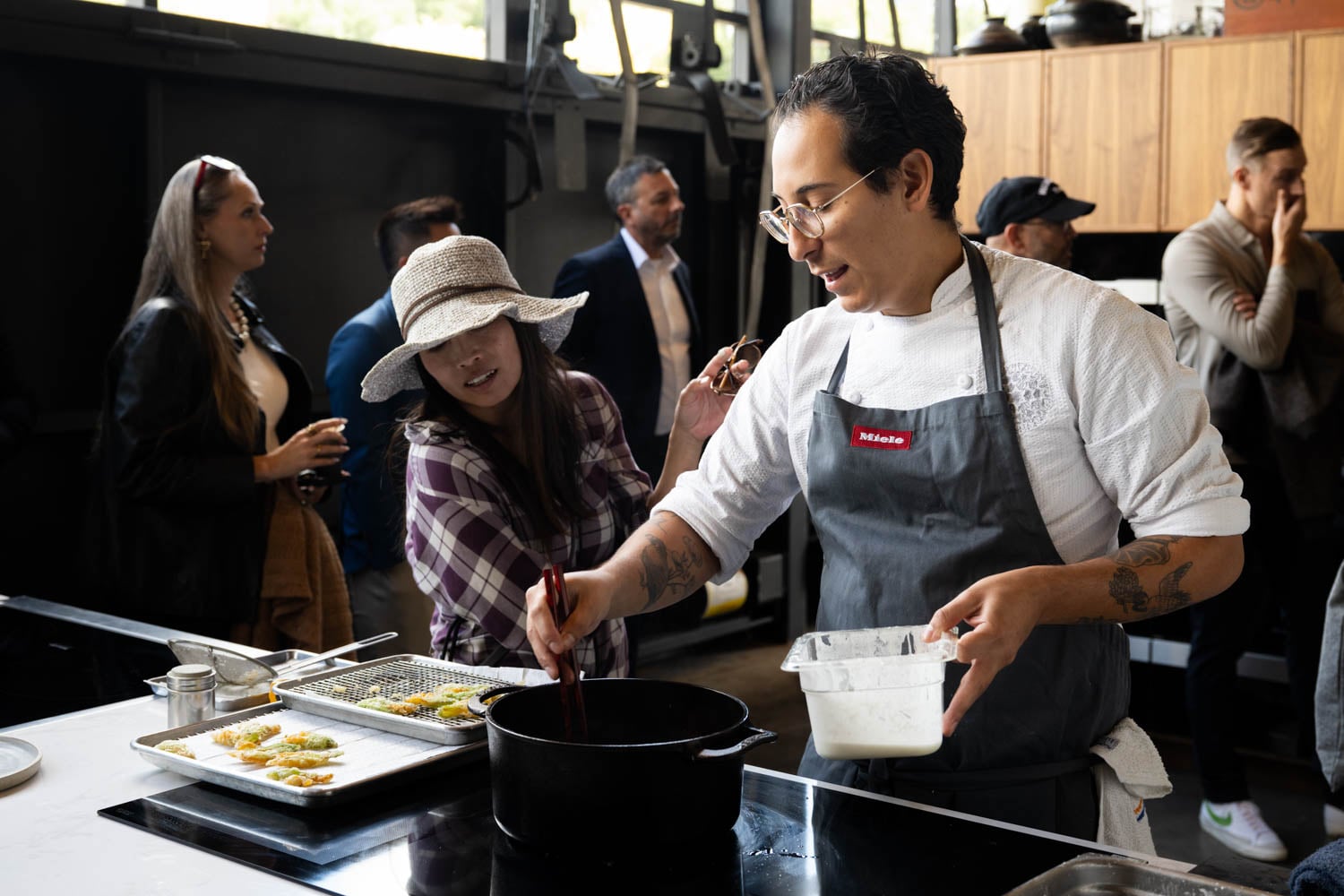 person cooking in the test kitchen