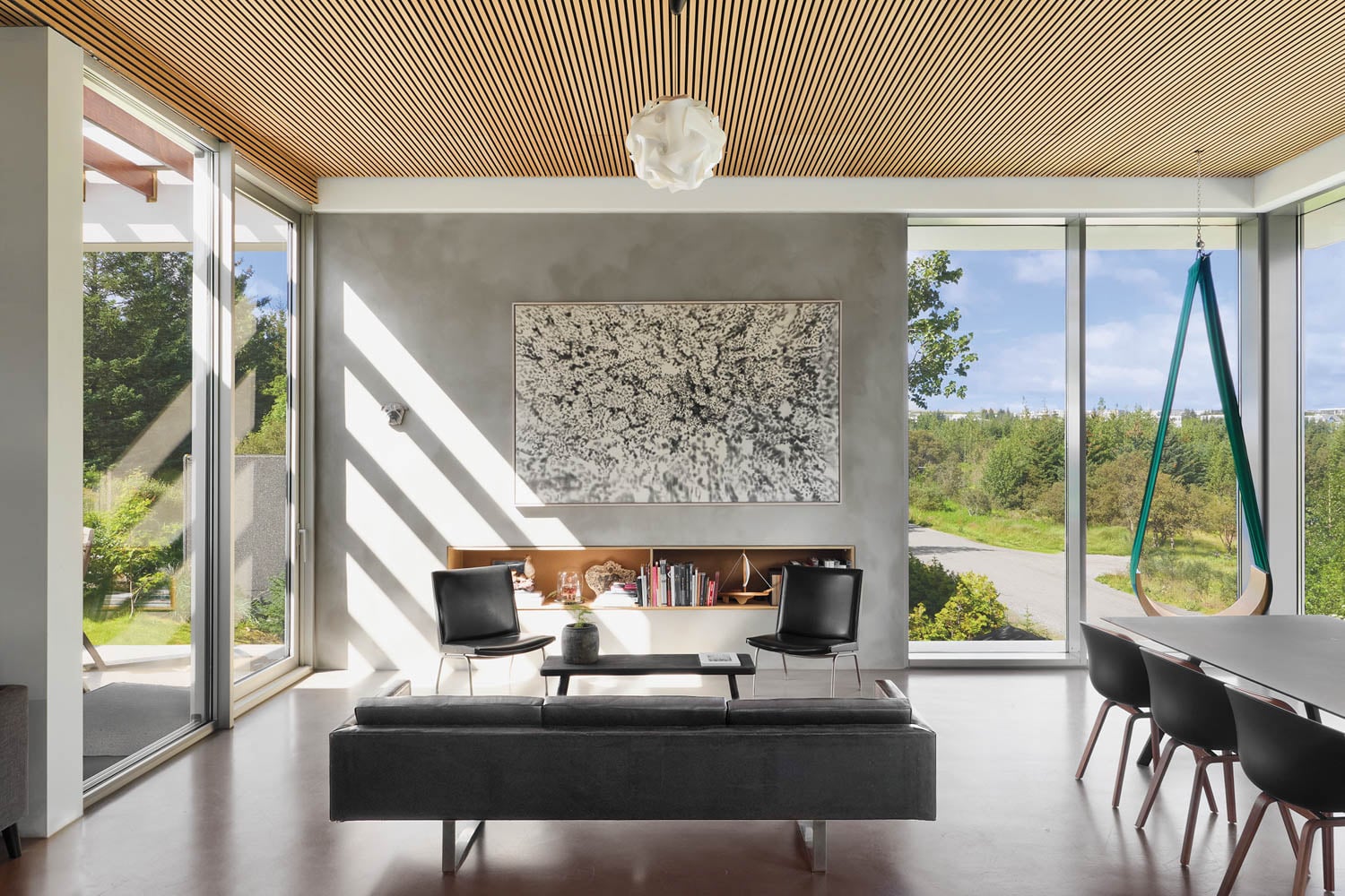 living room with fireplace and painting