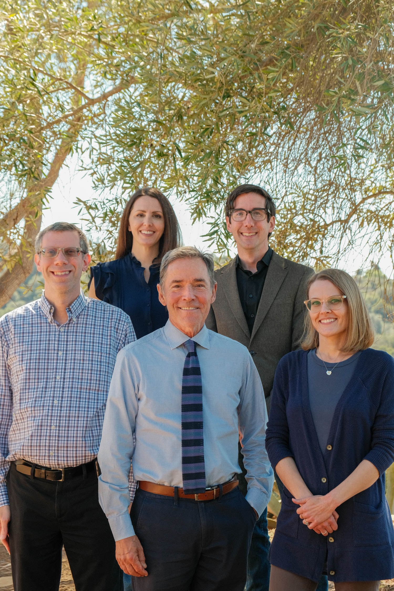 multiple people standing outside