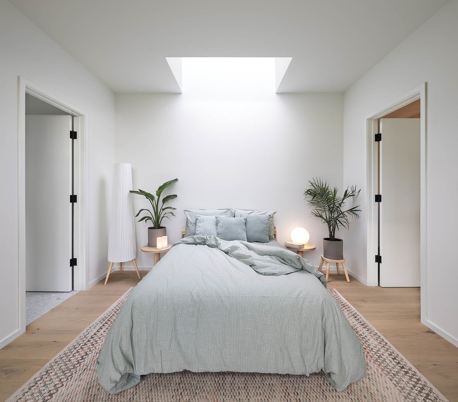 Main bedroom with light blue bedsheets