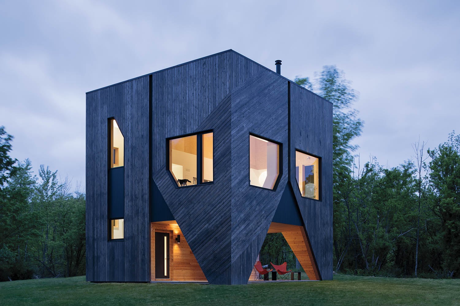 exterior of home on a grassy field