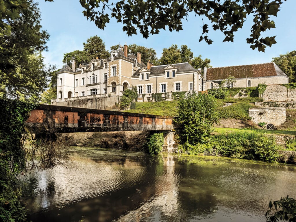 view of the chateau with the river running nearby