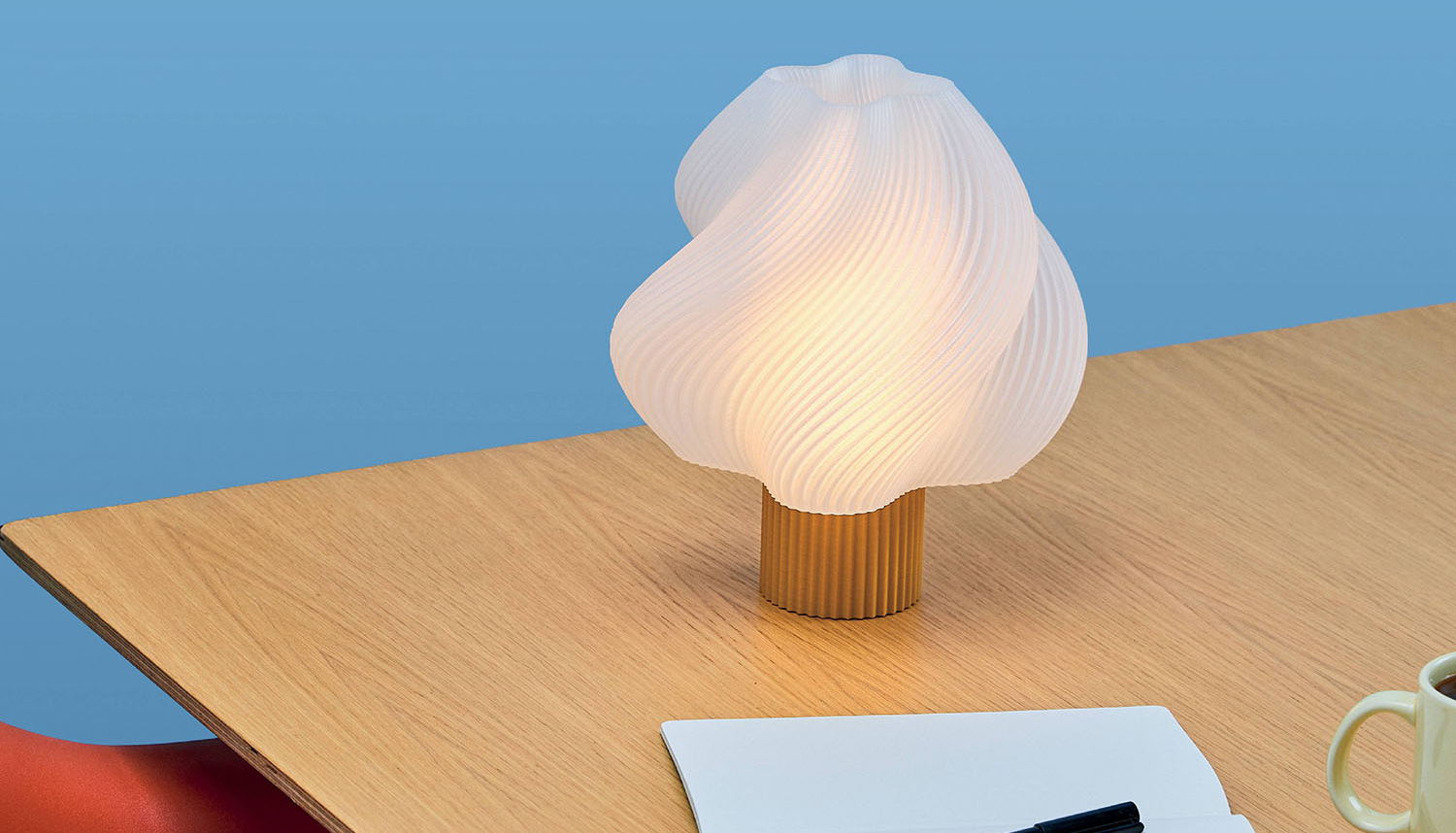 white soft serve lamp on desk