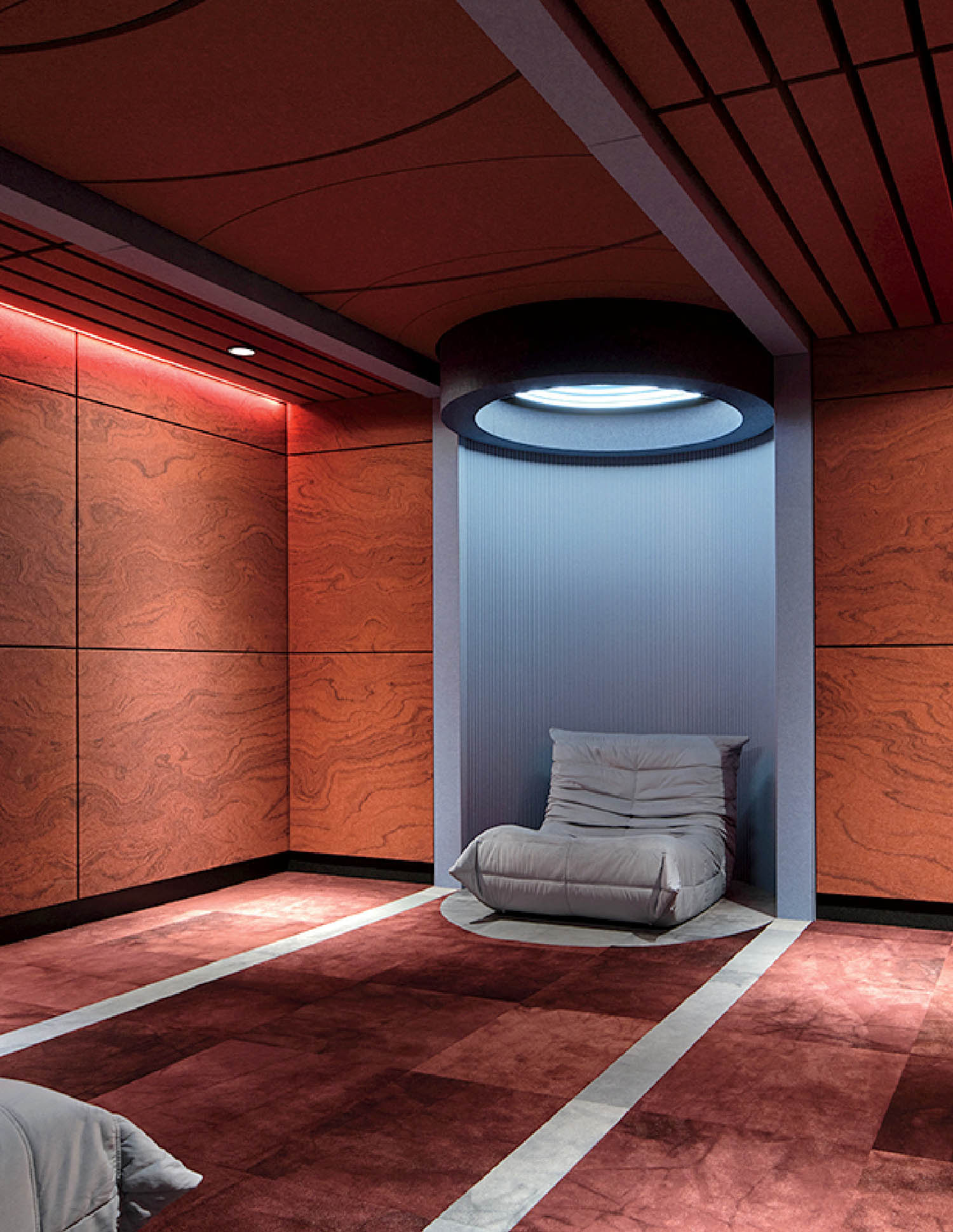 A room with a bed and a chair.