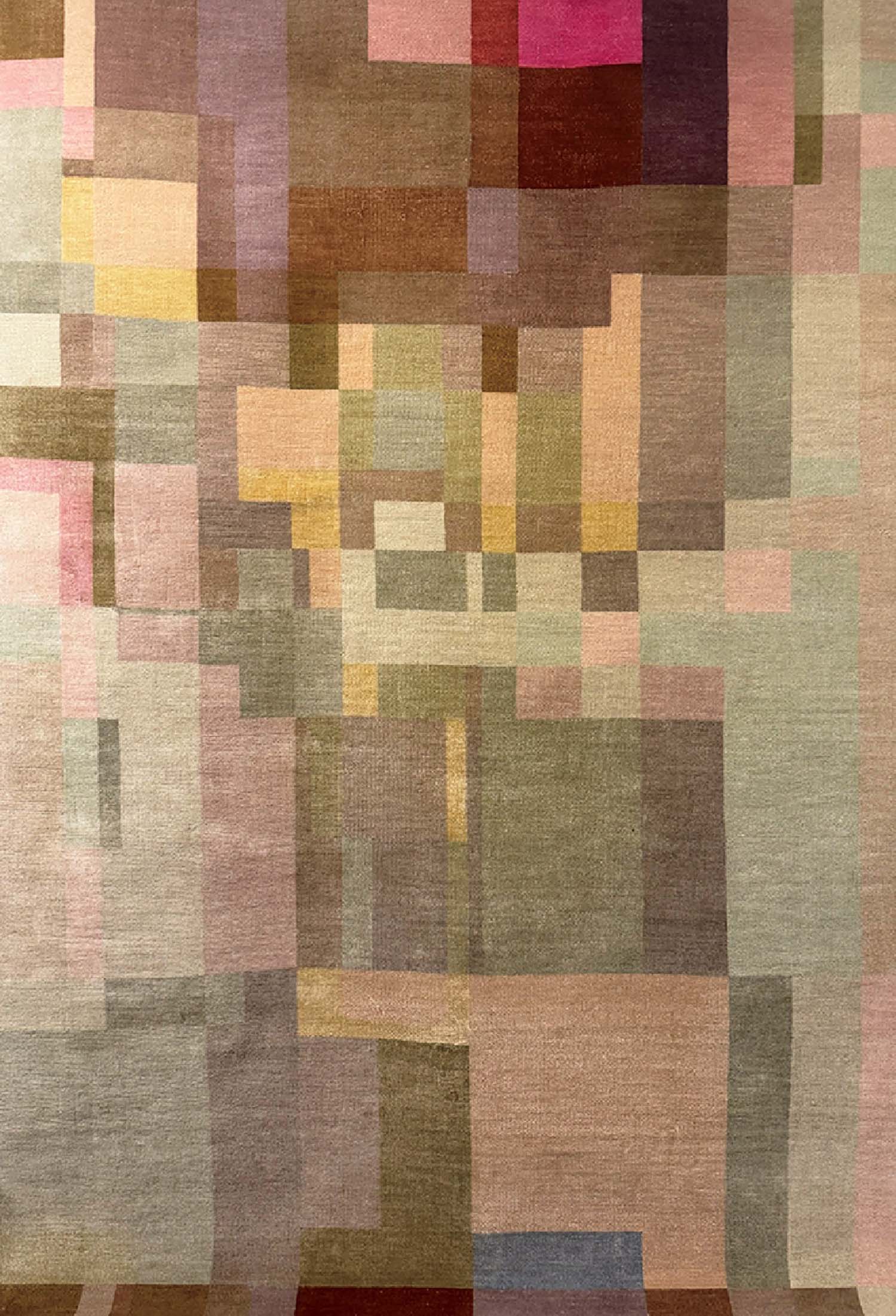 A rug with a multi colored pattern.