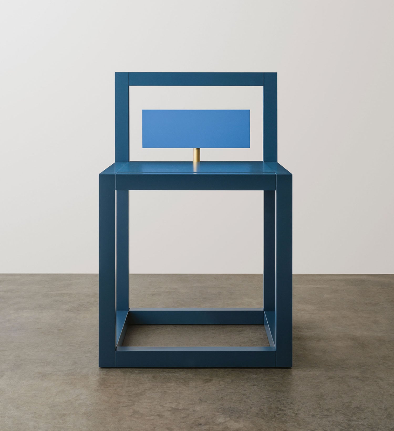 A blue chair with a yellow seat.