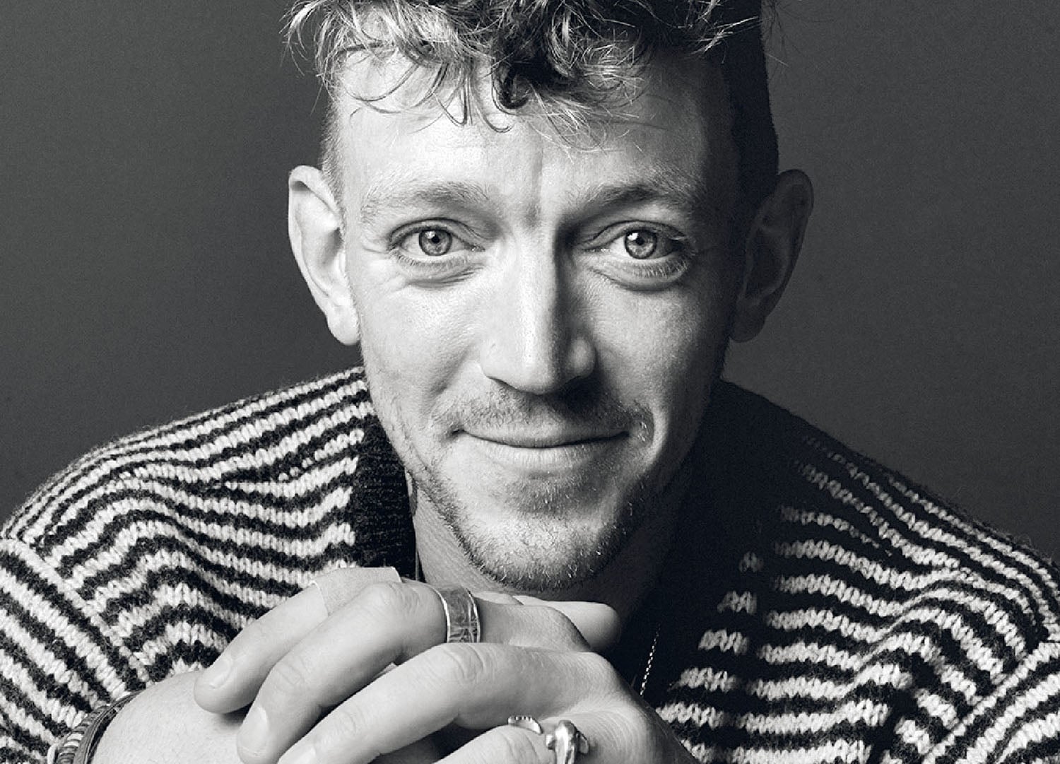 A man with a ring on his finger.