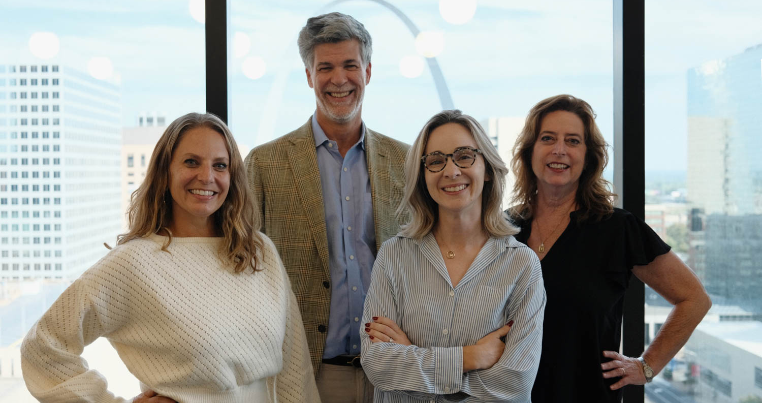 multiple people posing together