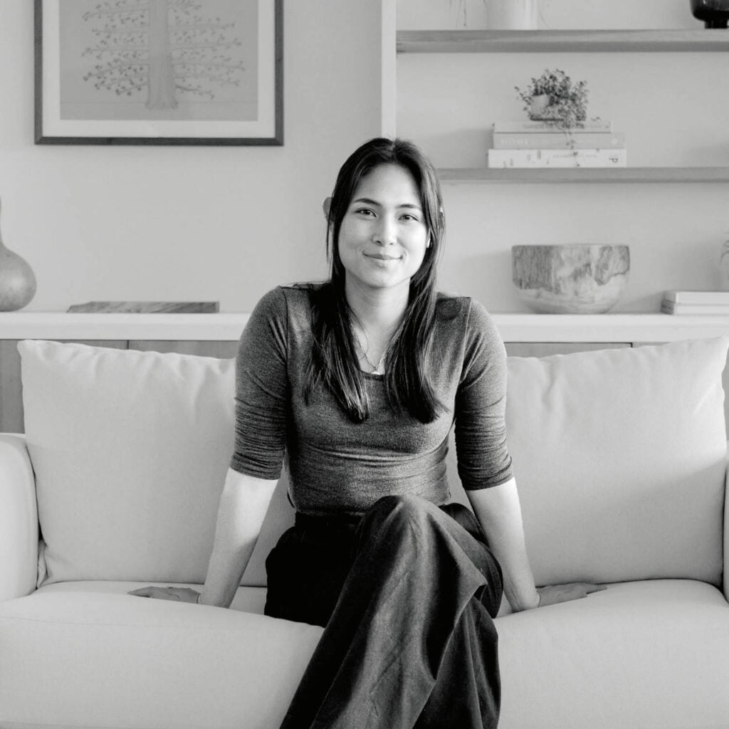 woman sitting on couch