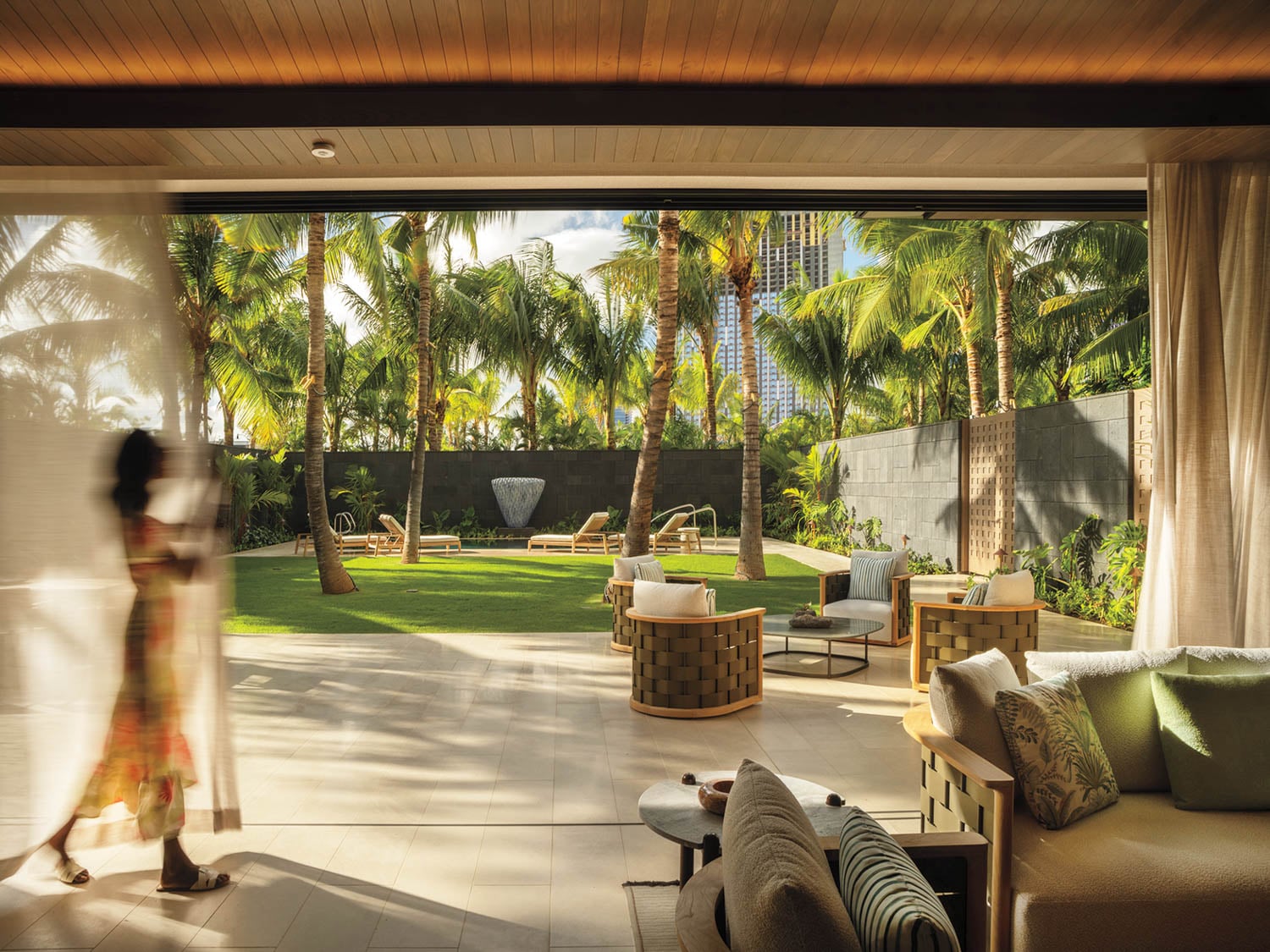 an open air patio near palm trees