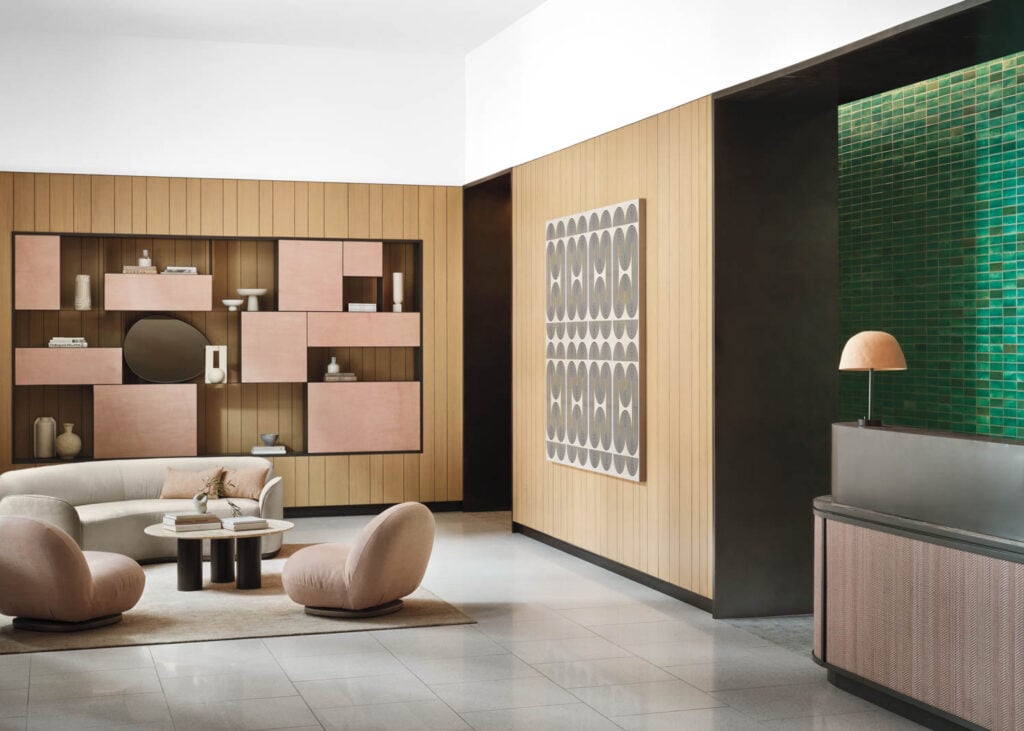 pale pink chairs near wood walls