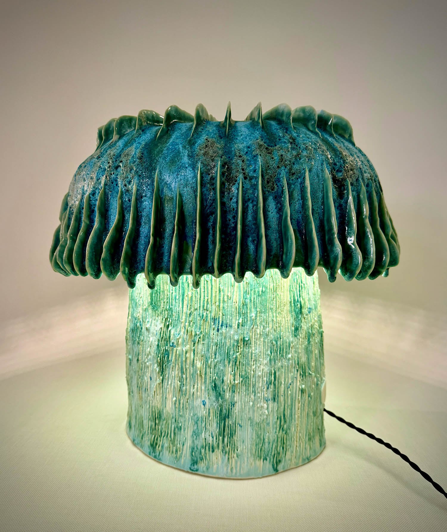 lit up green mushroom light