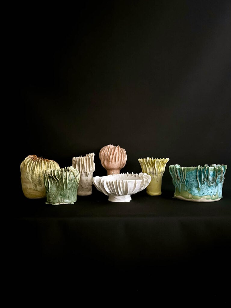 multiple mushroom inspired pottery pieces
