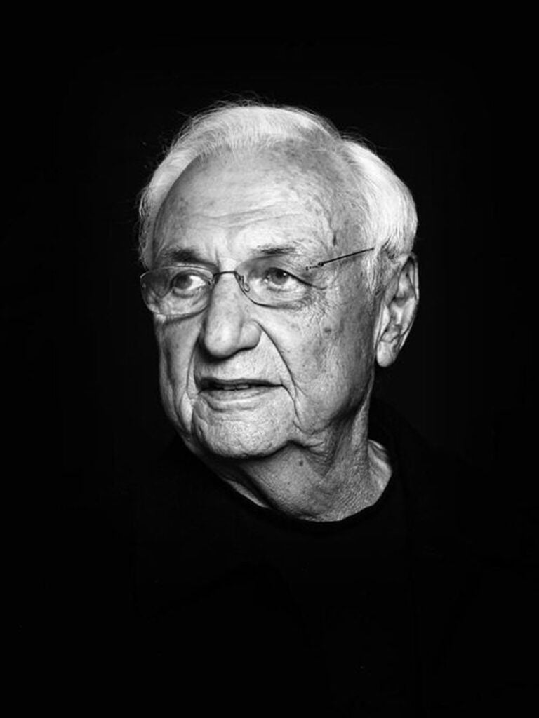 frank gehry on a black background