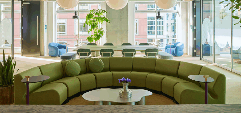 coworking space with curved green sofa