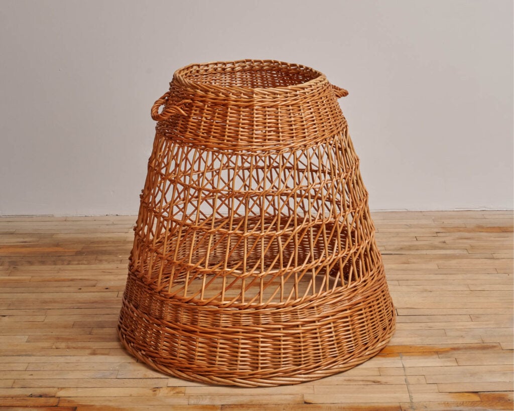a basket woven into the shape of a skirt
