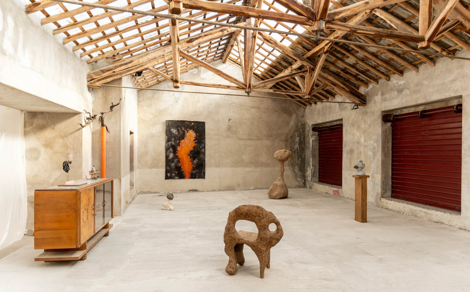 exhibition room with multiple art pieces