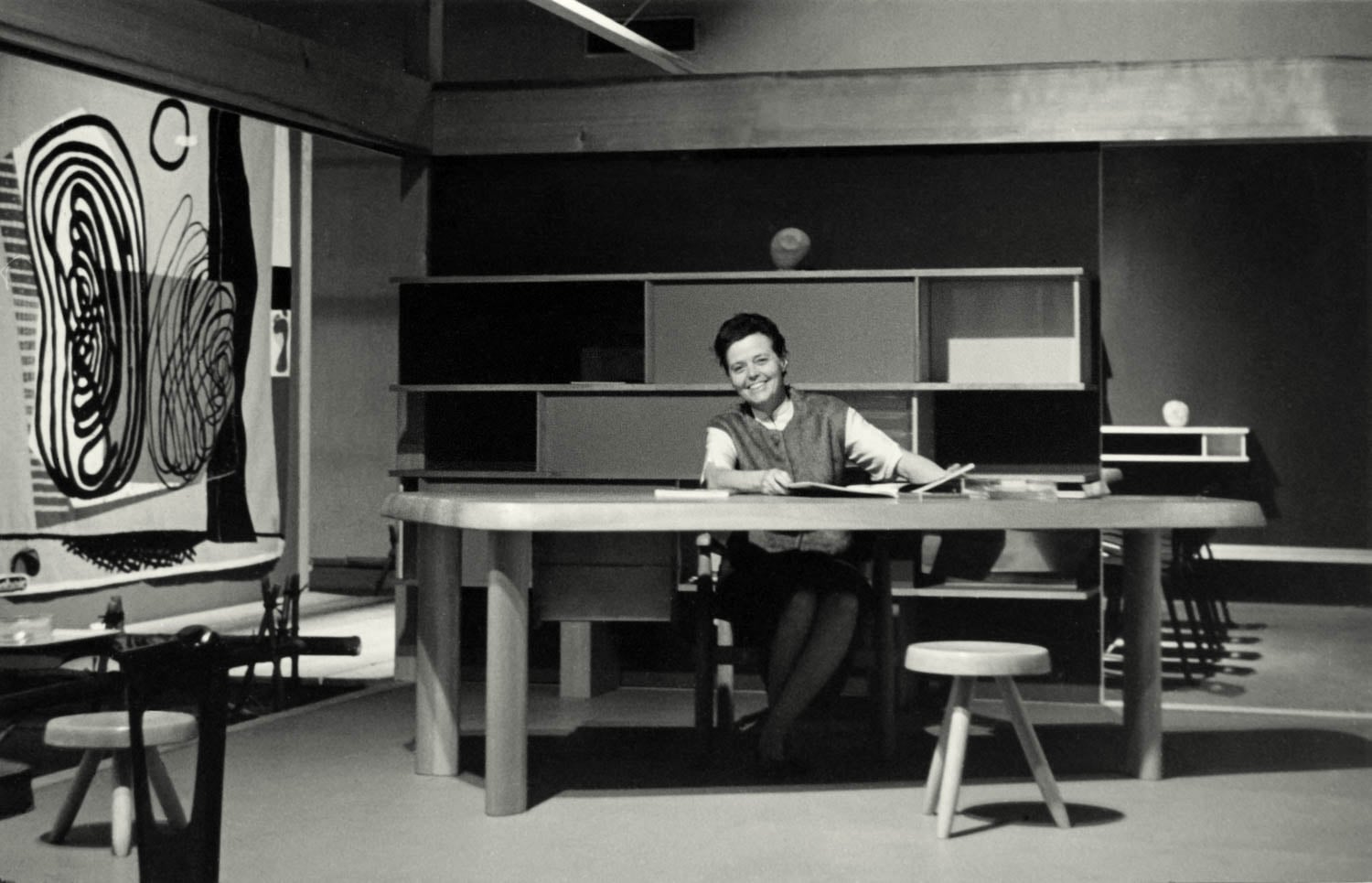 Charlotte Perriand at desk