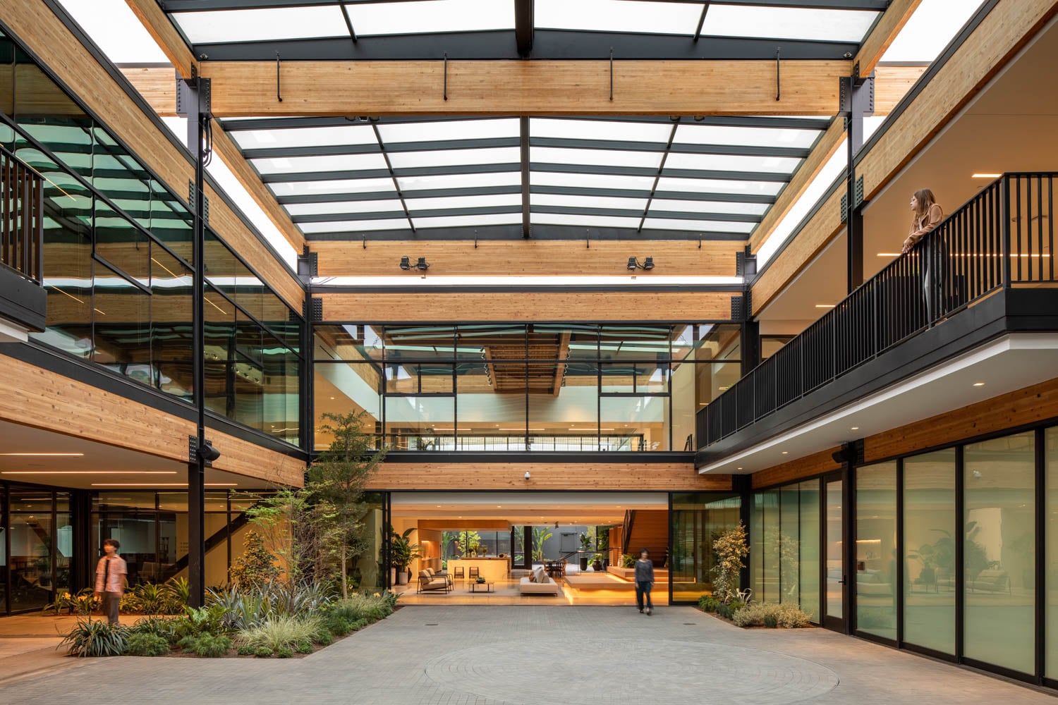 dining area with slatted roofs, glass windows and warm lighting