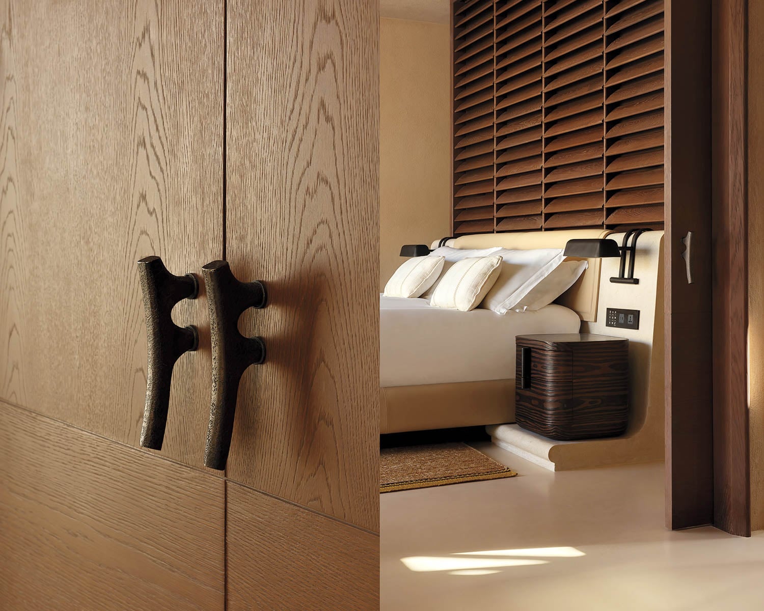 Modern bedroom with wooden wardrobe and unique dark handles