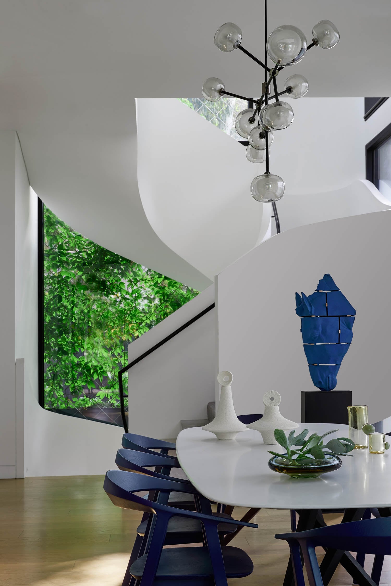dining area with blue graphic artwork of horse head