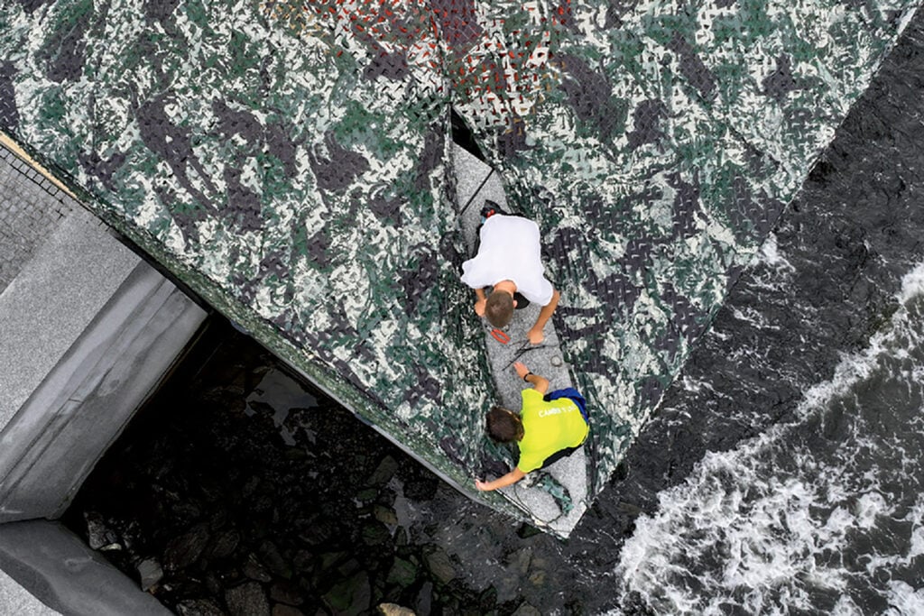 A man climbing a wall.