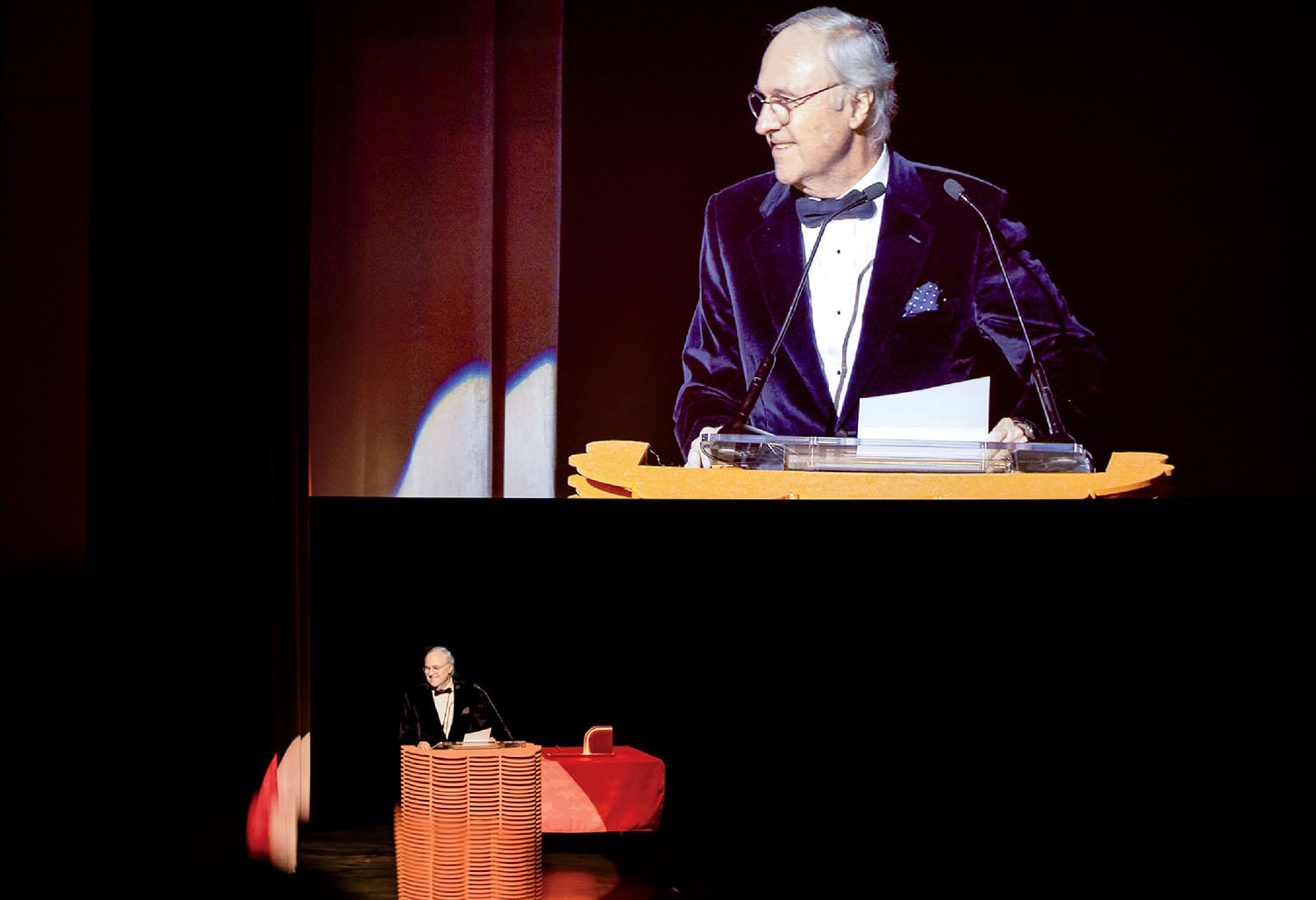 A man in a tuxed suit.