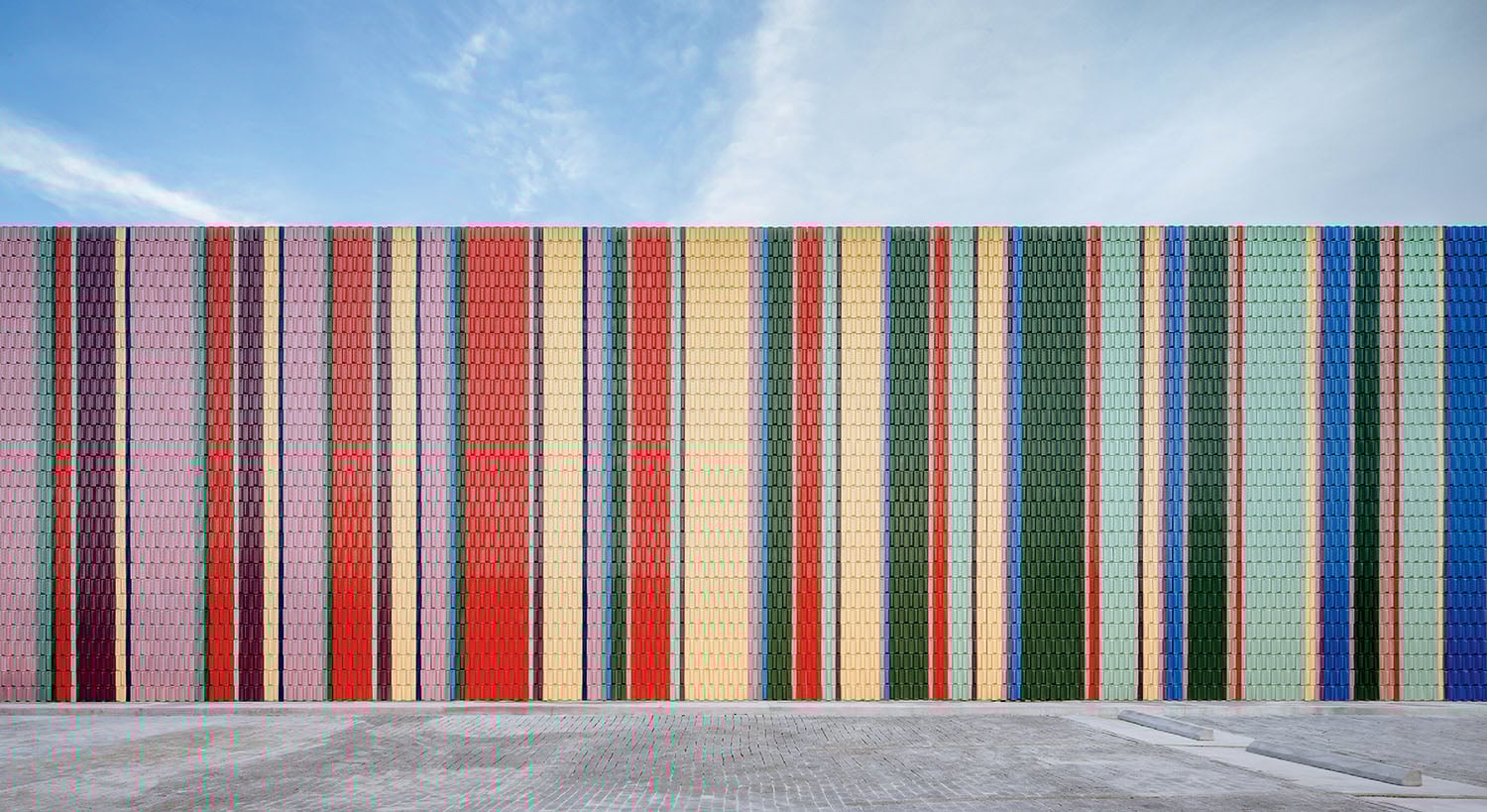 A colorful building with a blue sky in the background.