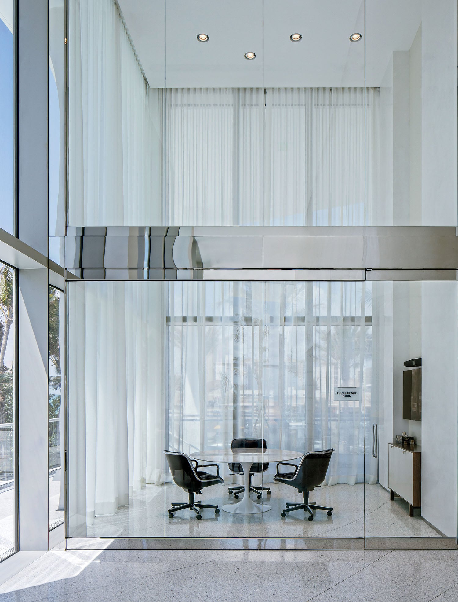 A glass wall in a modern office.