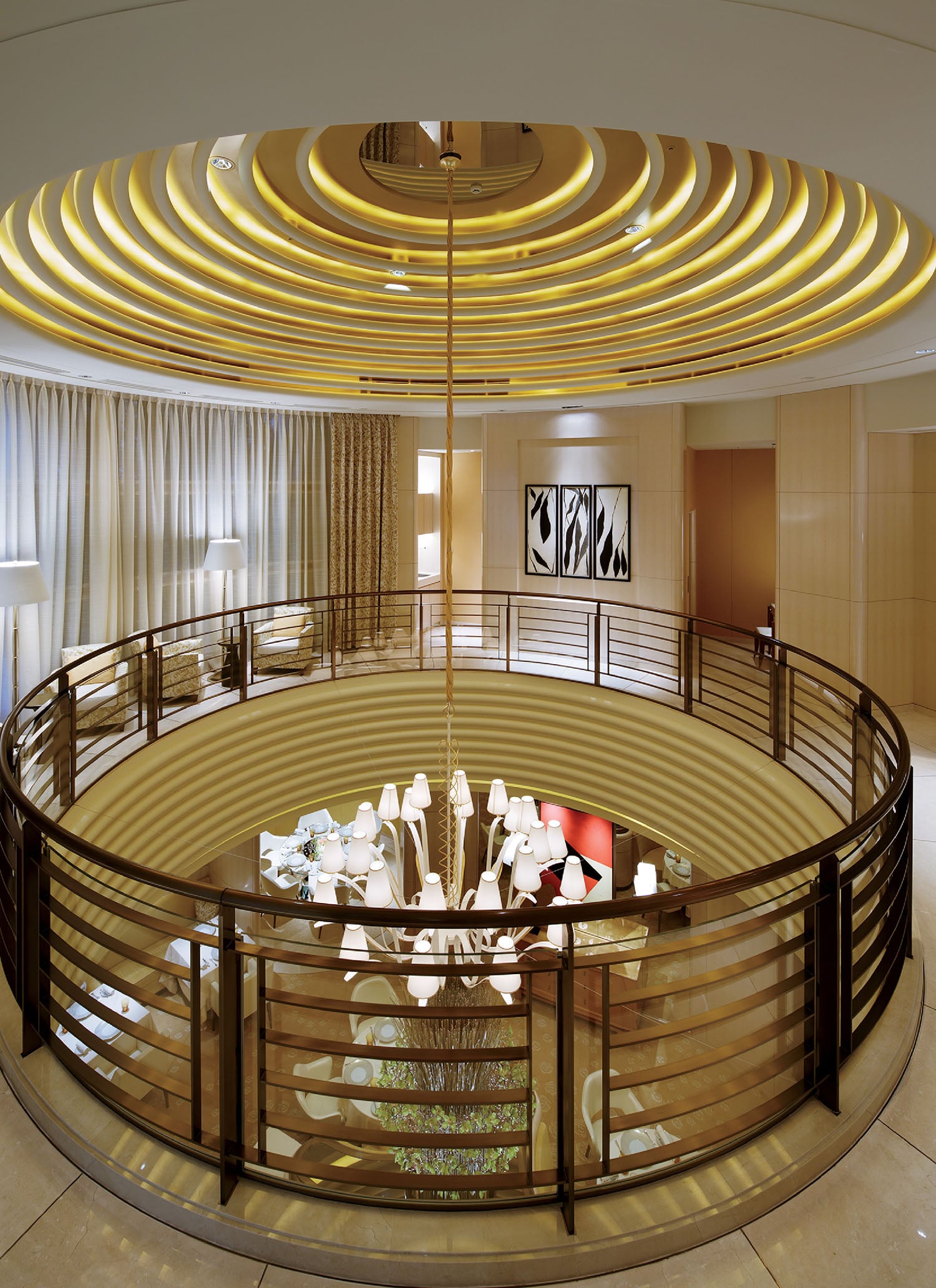 A circular table with a lamp on top.