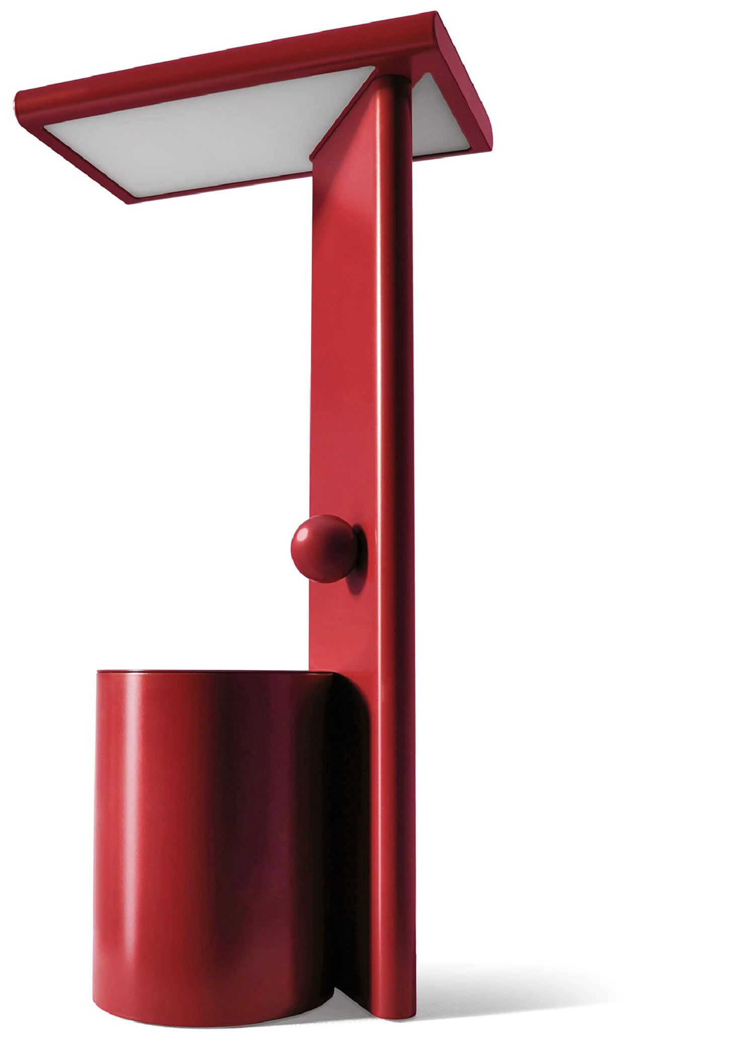 A red lamp with a white light on it.