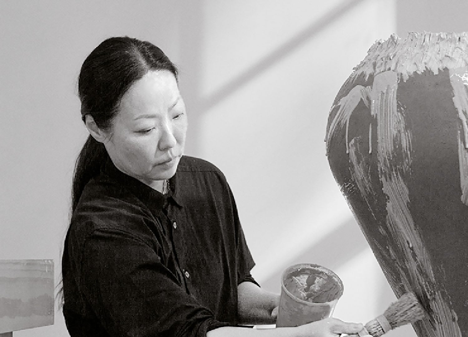 A woman is painting.