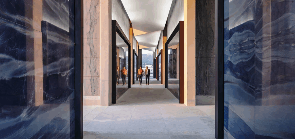 Futuristic corridor with geometric ceiling and glossy blue walls