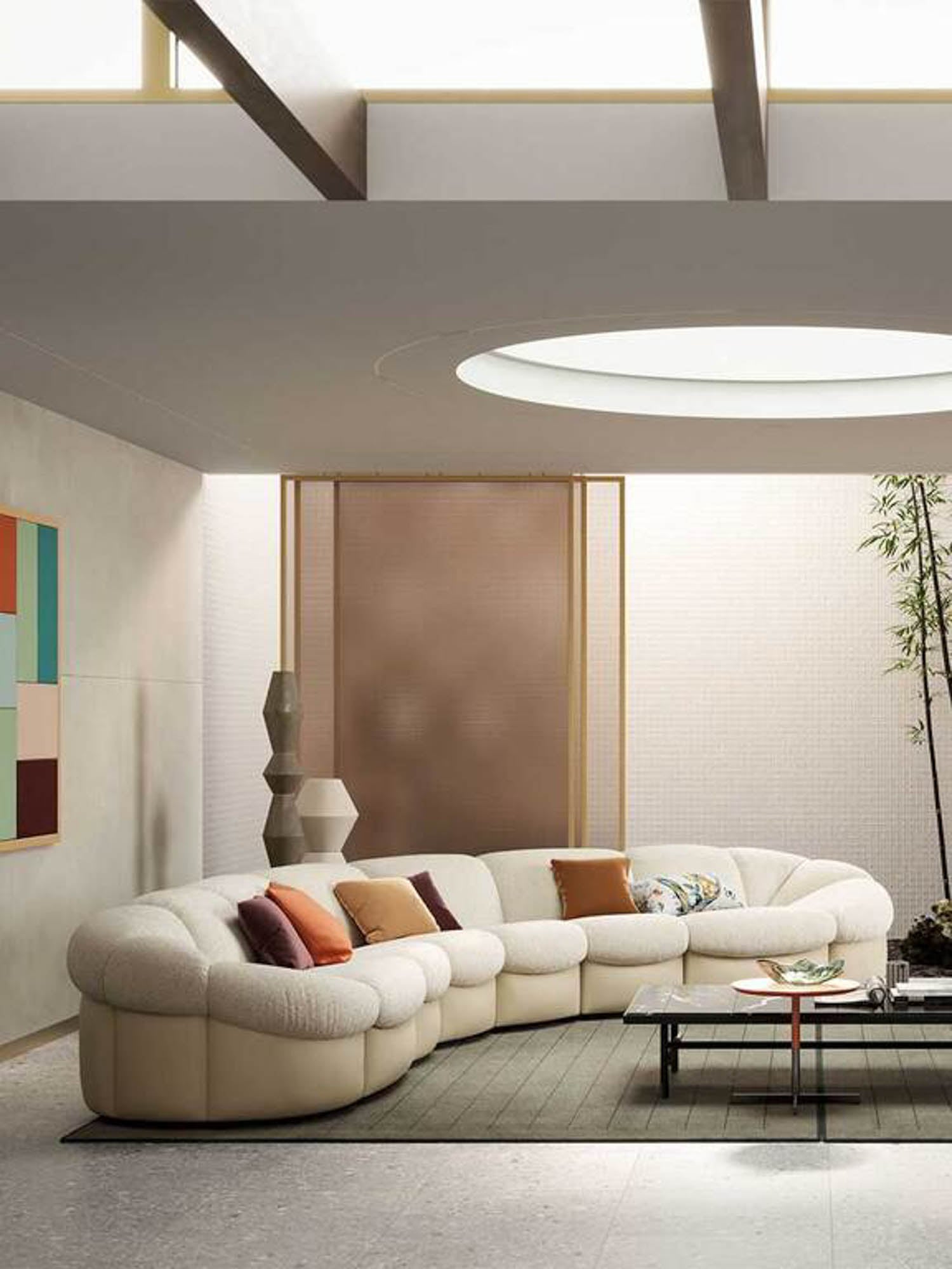 a cream couch with pillows