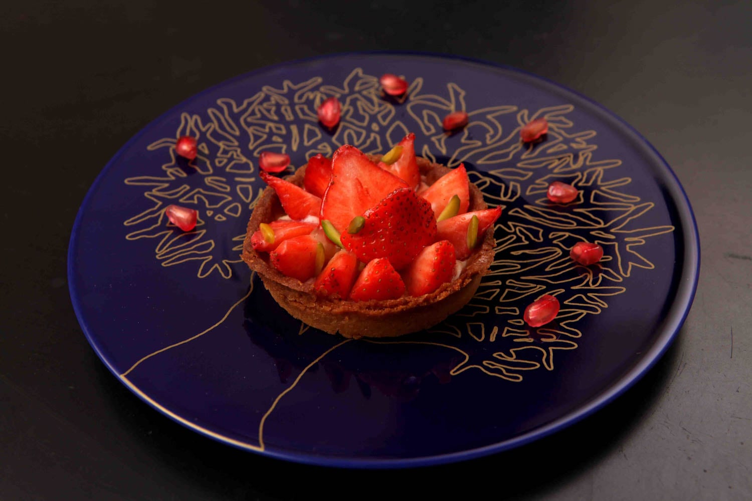 black plate with red flower