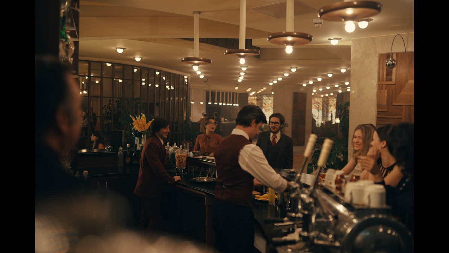 A dimly lit bar with a warm, vintage ambiance